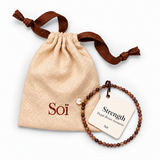 Purple brown aventurine bracelet with its Strength meaning card on a Soï linen gift pouch